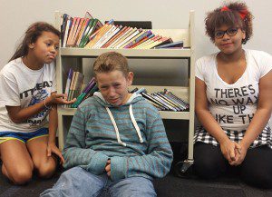 Sad Students In Classroom Library